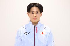 日本代表のジャージを着た体操競技日本代表の萱 和磨選手の写真