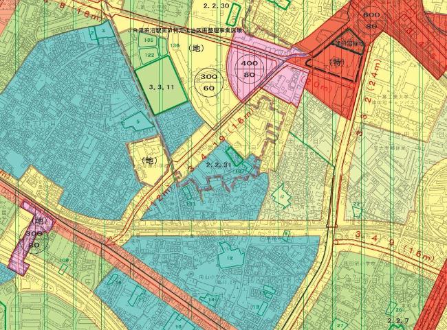 赤、ピンク、黄色、緑、青で区分けされた習志野市の一部の地図の写真