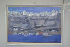 街・海・空が描かれた、松本忠雄さんの作品「フィラの街」の写真