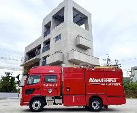 中央消防署の赤い消防車を斜め左からみた写真